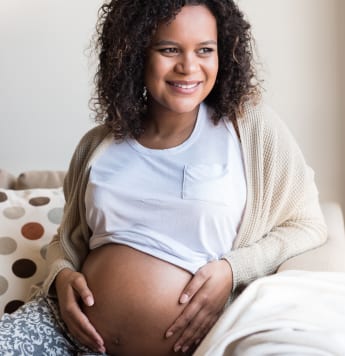 Pregnant women smiling